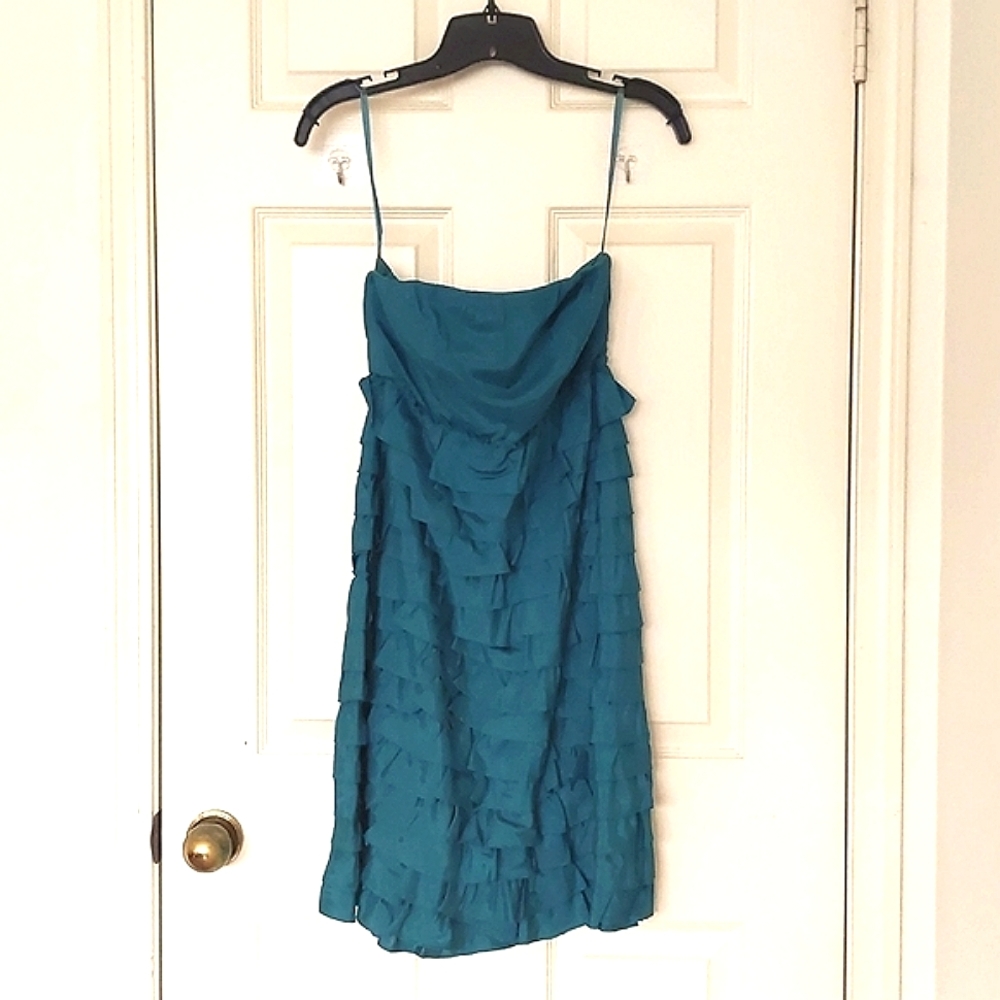 NWT. The Limited Fully lined teal color strapless ruffle tiered dress.